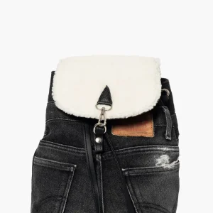 Zaino jeans nero e pattina eco pelliccia bianca